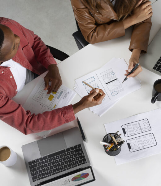 top-view-people-working-with-laptops
